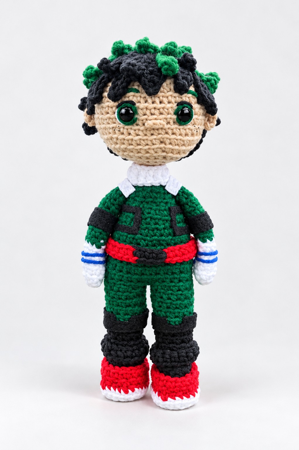 Green hero crochet character plushie in a green uniform