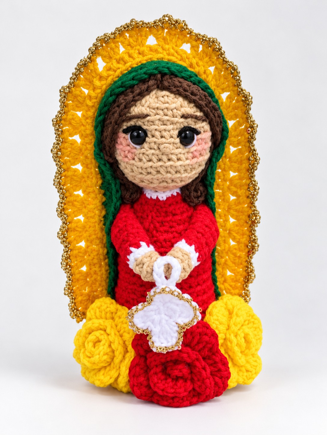 Religious crochet character plushie with gold halo and red dress