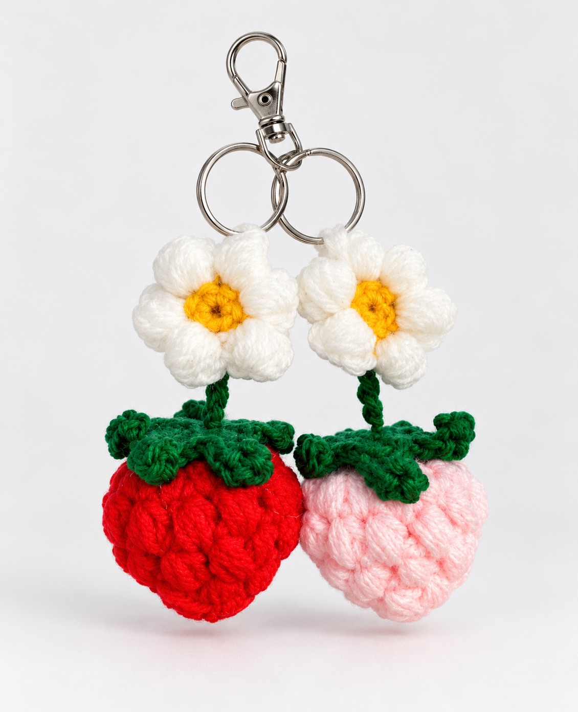 Crochet strawberry and daisy keychains