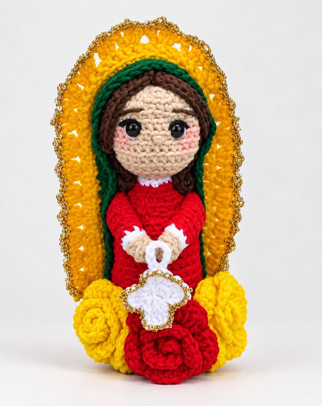 Religious crochet doll with gold halo