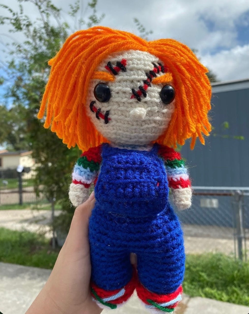 Orange-haired crochet character plushie