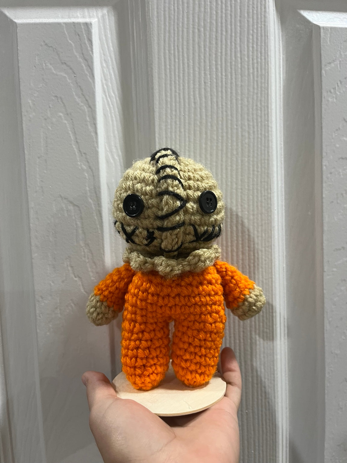 Stitched orange character crochet plushie